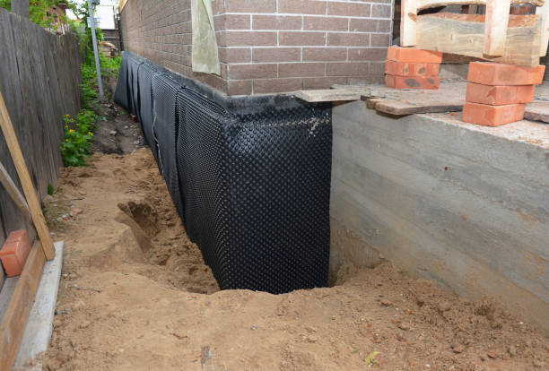 Happy homeowners after waterproofing job in Wauconda